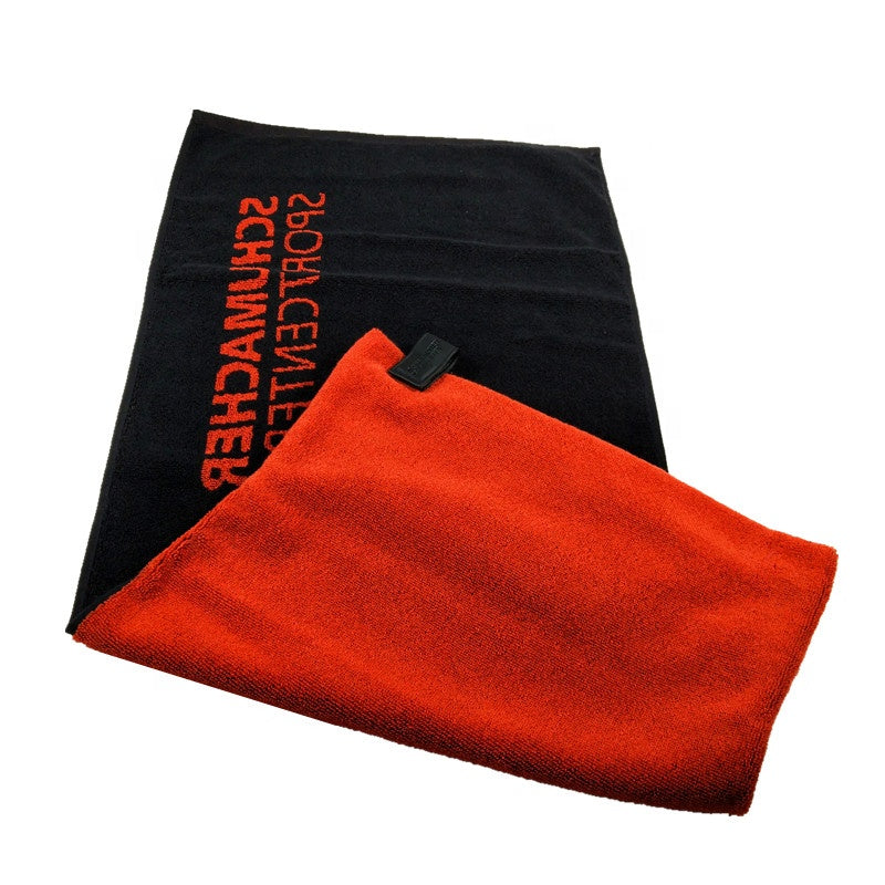 Black and red towel with text on a white background