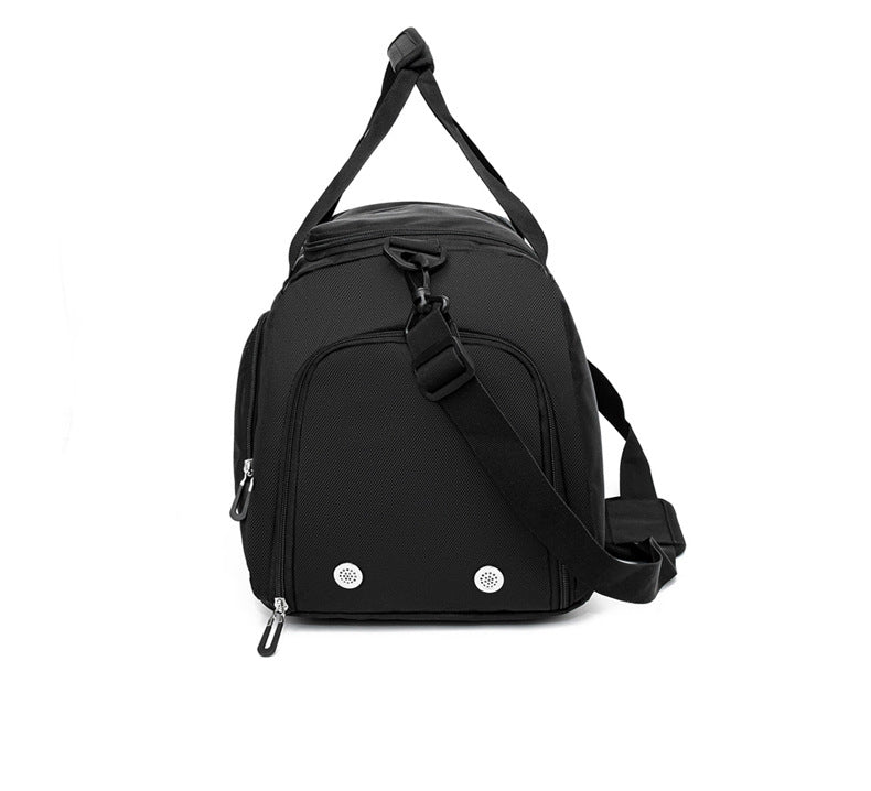 Black backpack with a shoulder strap on a white background